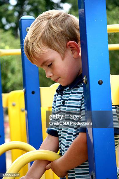 thoughtful boy - nursery school child stock pictures, royalty-free photos & images