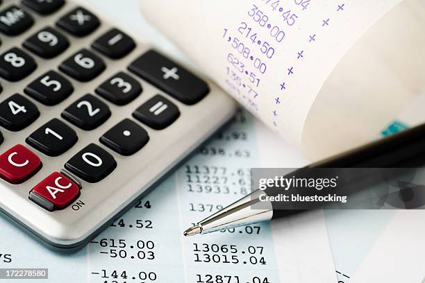 account plans with a calculator and pen - receipt bildbanksfoton och bilder