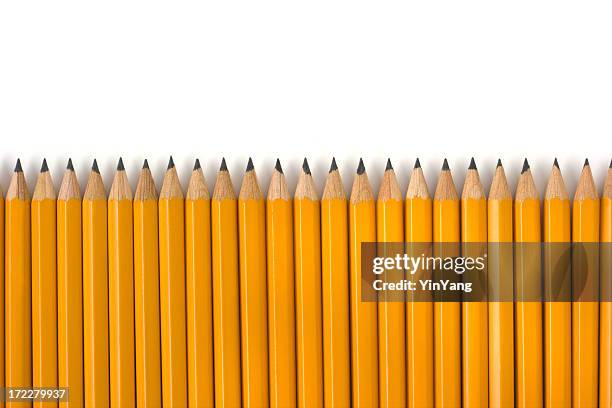 row of yellow pencils repetition for education on white background - pencil stockfoto's en -beelden