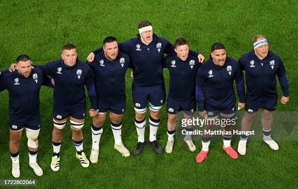 Players of Scotland sing their national anthem prior to the Rugby World Cup France 2023 match between Ireland and Scotland at Stade de France on...