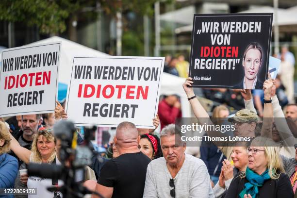 Demonstrators protest against a final election rally of the right-wing Alternative for Germany ahead of Hesse state elections on October 07, 2023 in...