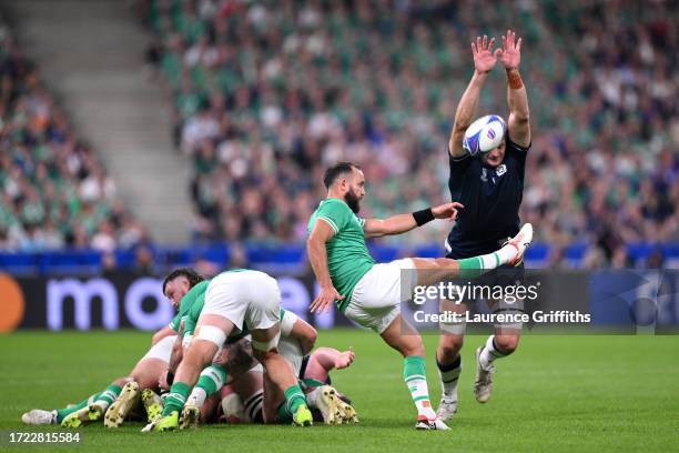 Jamison Gibson-Park of Ireland clears the ball out of the ruck whilst under pressure from Richie Gray of Scotland during the Rugby World Cup France...