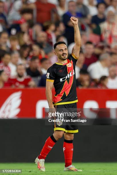 Alvaro Garcia of Rayo Vallecano celebrates after scoring the team's second goal during the LaLiga EA Sports match between Sevilla FC and Rayo...