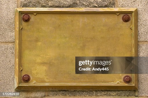 Bronze empty plaque fixed on wall Bronze empty plaque fixed on wall
