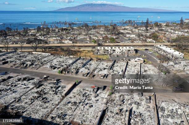 In an aerial view, burned cars and structures are seen in a neighborhood that was destroyed by a wildfire on October 07, 2023 in Lahaina, Hawaii. The...