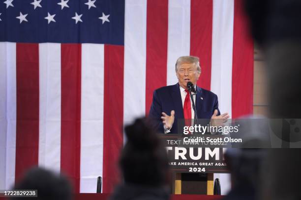 Republican presidential candidate former President Donald Trump speaks to guests during a rally on October 07, 2023 in Waterloo, Iowa. The rally is...