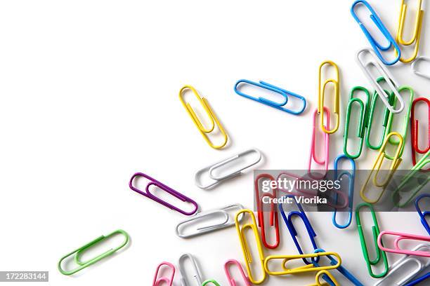 paper clips on white - clip stockfoto's en -beelden