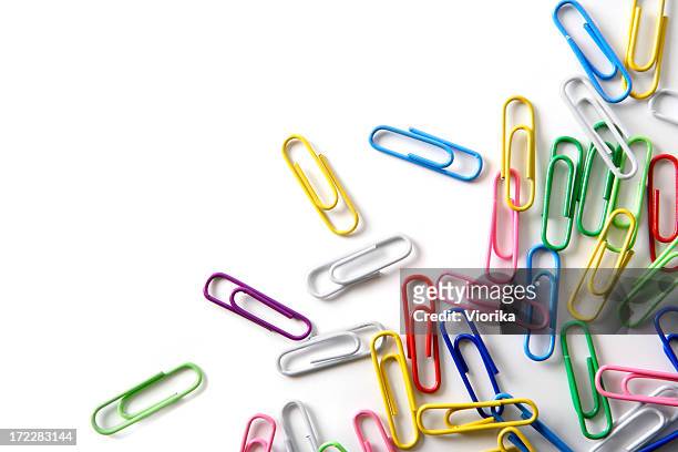 paper clips on white - clip stock pictures, royalty-free photos & images