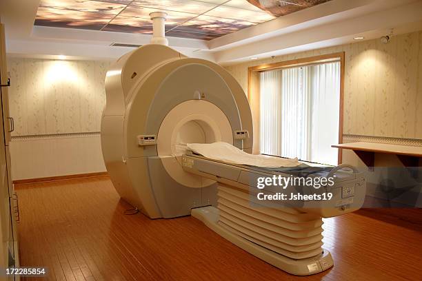 mri scanner in empty medical facility - mri room stock pictures, royalty-free photos & images