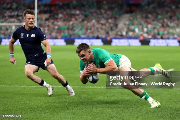 Garry Ringrose of Ireland scores his team's sixth try during the Rugby World Cup France 2023 match between Ireland and Scotland at Stade de France on...