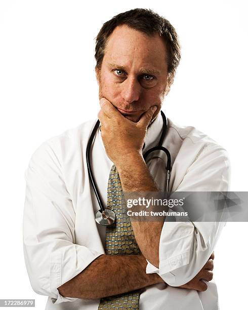 middle aged male doctor poses for doctors day photo - twohumans bildbanksfoton och bilder