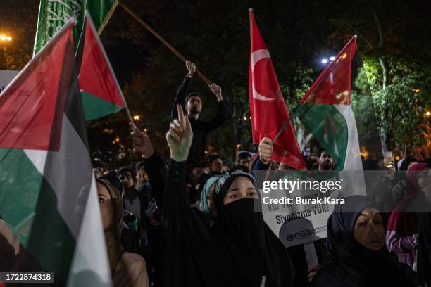 People gather in support of the recent attacks on Israel by the Palestinian militant group Hamas at Fatih Mosque on October 07, 2023 in Istanbul,...