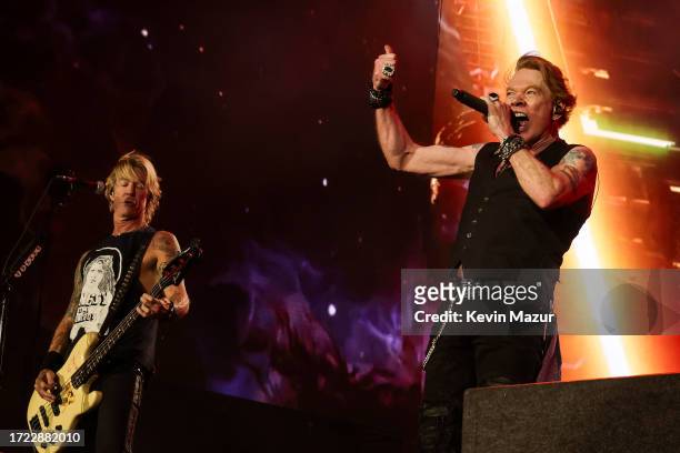 Duff McKagan and Axl Rose of Guns N' Roses perform onstage during the Power Trip music festival at Empire Polo Club on October 06, 2023 in Indio,...