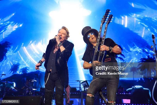 Axl Rose and Slash of Guns N' Roses perform onstage during the Power Trip music festival at Empire Polo Club on October 06, 2023 in Indio, California.