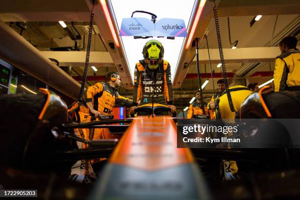 Lando Norris of Great Britain and McLaren F1 in the garage prior to the sprint race ahead of the F1 Grand Prix of Qatar at Lusail International...