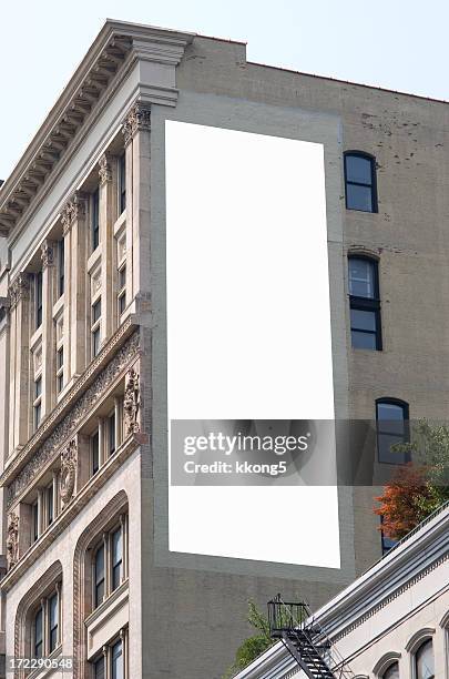 billboard advertisement space in manhattan new york - vertical billboard stock pictures, royalty-free photos & images