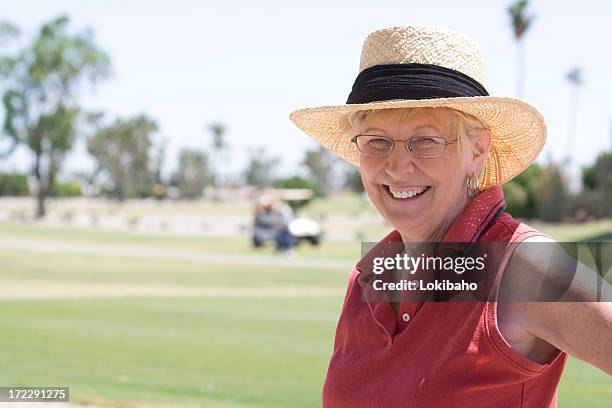 lady on golf course - sun city arizona stock pictures, royalty-free photos & images