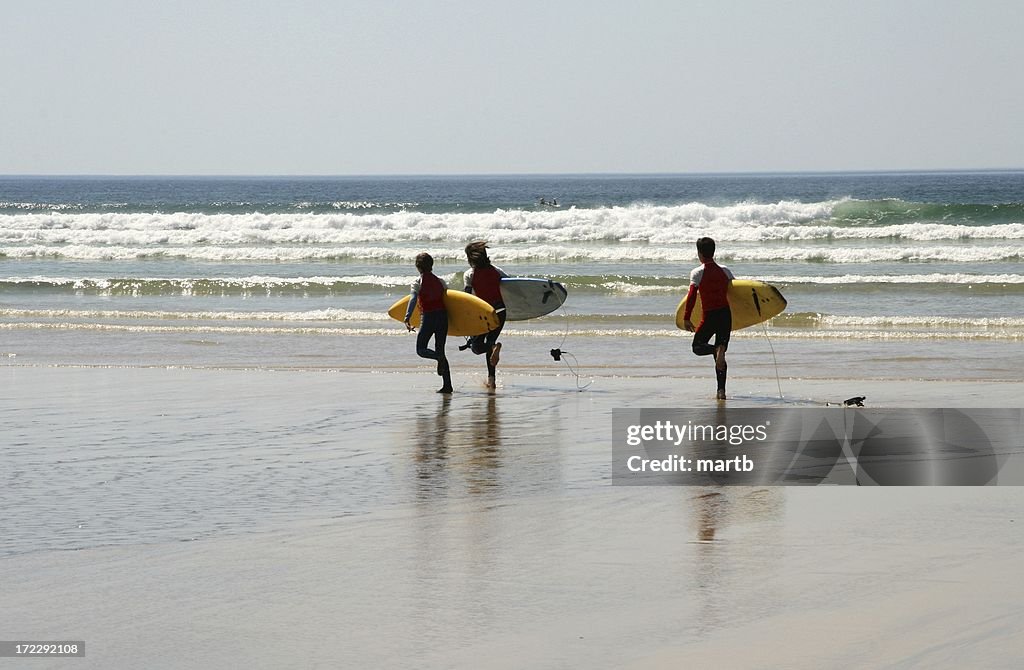 Surfers Race for the Waves