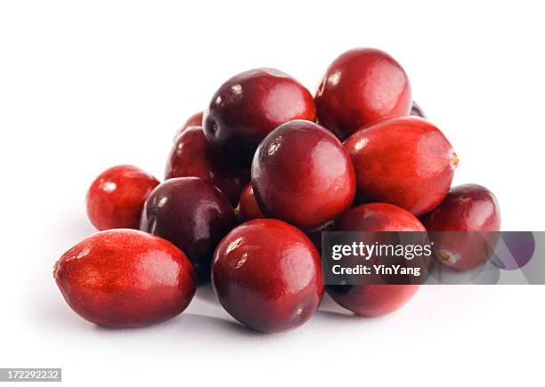 cranberries red berry fruit pile isolated on white background - cranberries stock pictures, royalty-free photos & images