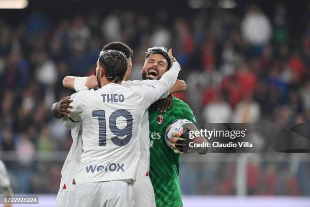 Olivier Giroud and players of AC Milan celebrate the win at the end of the Serie A TIM match between Genoa CFC and AC Milan at Stadio Luigi Ferraris...