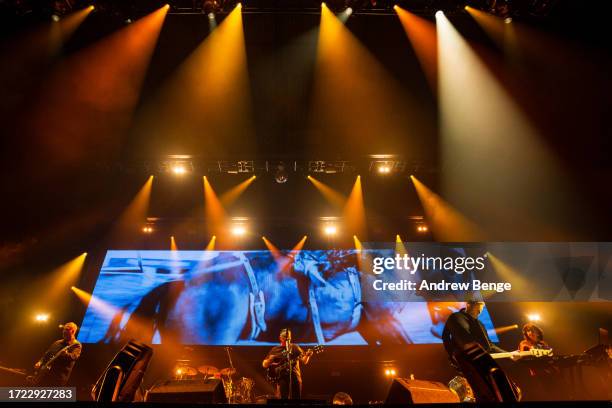 Phil Cunningham, Stephen Morris, Bernard Sumner, Tom Chapman and Gillian Gilbert of New Order perform at First Direct Arena on October 07, 2023 in...