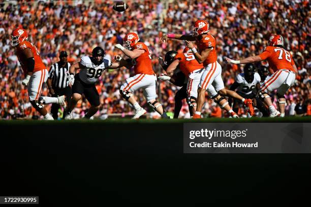 Cade Klubnik of the Clemson Tigers throws a pass against the Wake Forest Demon Deacons in the first quarter at Memorial Stadium on October 07, 2023...