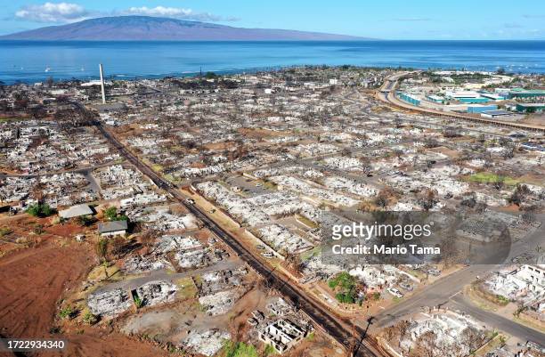 In an aerial view, burned structures and cars are seen nearly two months after a devastating wildfire on October 07, 2023 in Lahaina, Hawaii. The...