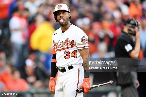 Aaron Hicks of the Baltimore Orioles reacts after striking out during the ninth inning of Game One of the American League Division Series against the...