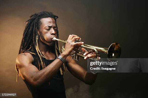 playing trumpet - blues musician stock pictures, royalty-free photos & images