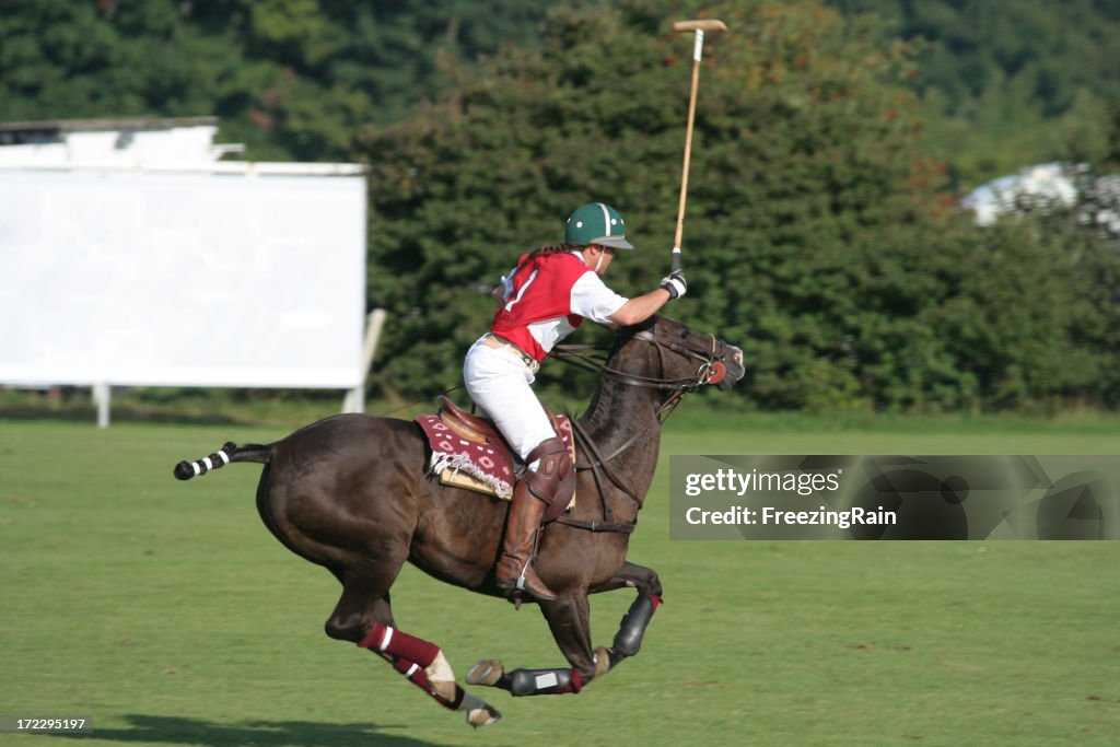 Woman plays polo