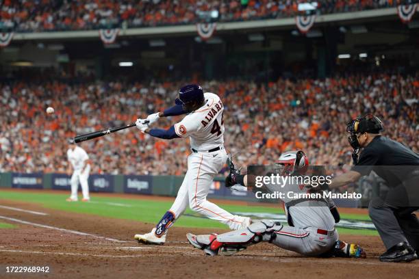 Yordan Alvarez of the Houston Astros hits a home run during the third inning against the Minnesota Twins during Game One of the Division Series at...