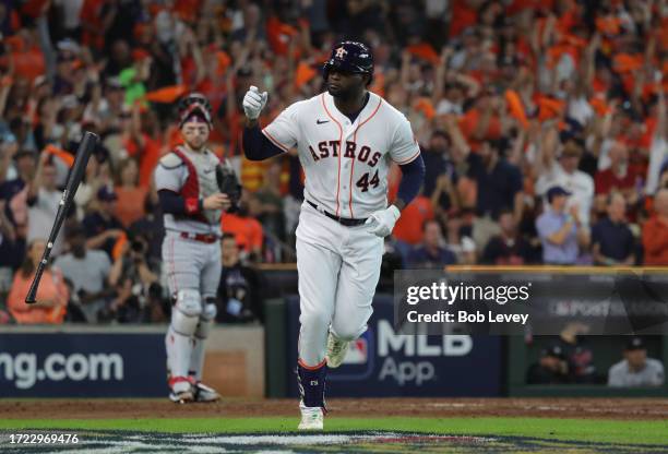 Yordan Alvarez of the Houston Astros reacts after hitting a home run during the third inning against the Minnesota Twins during Game One of the...