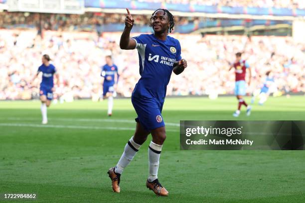 Raheem Sterling of Chelsea celebrates after scoring the team's third goal during the Premier League match between Burnley FC and Chelsea FC at Turf...