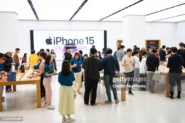 Customers experience the newly launched iPhone 15 series , Apple Watch Ultra 2 and Apple Watch 9 at Apple store in Yeouido on October 13, 2023 in...