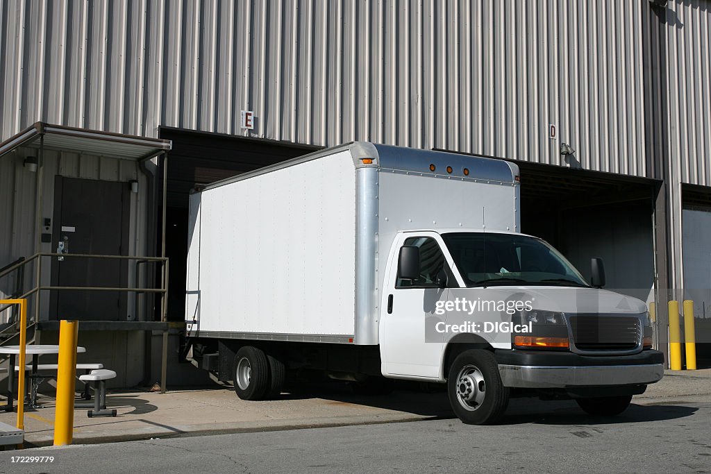 An image of a white delivery truck