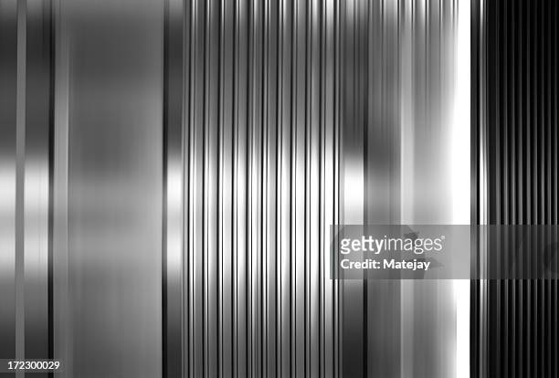 abstract background of vertical stainless steel panels - silver bildbanksfoton och bilder