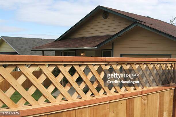 wooden privacy fence with diagonal trellis detail - wooden fence bildbanksfoton och bilder