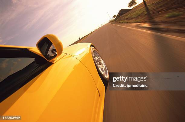 driving into the sunset - yellow car stock pictures, royalty-free photos & images