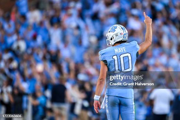 Drake Maye of the North Carolina Tar Heels reacts after throwing for a touchdown against the Syracuse Orange during the second half of their game at...