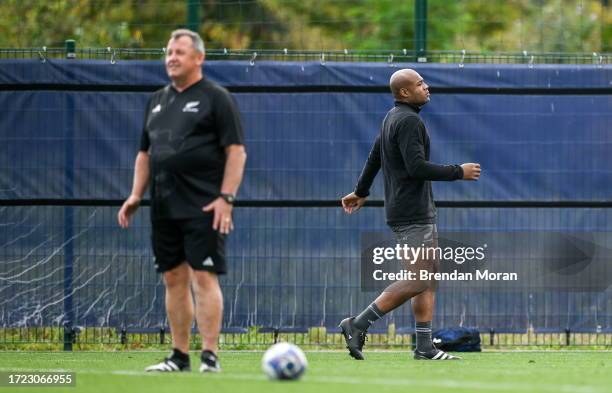 Paris , France - 13 October 2023; Mark Telea walks past head coach Ian Foster during a New Zealand captain's run at INSEP in Paris, France.