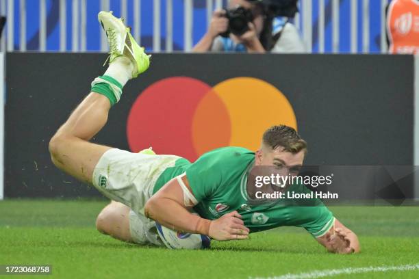 Garry Ringrose of Ireland scores a try during the Rugby World Cup France 2023 match between Ireland and Scotland at Stade de France on October 7,...