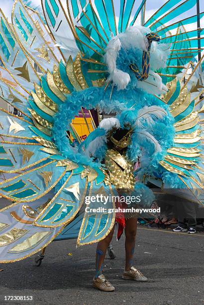 woman in a carnival parade as a blue peacock  - notting hill carnival stock pictures, royalty-free photos & images