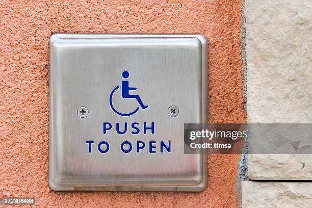 push button for wheelchair users - pushing stock pictures, royalty-free photos & images