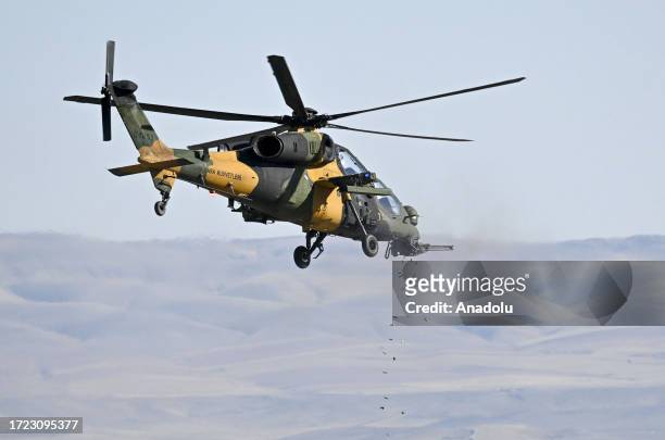 Helicopters perform during the military drill of Turkish Armed Forces in Ankara, Turkiye on October 13, 2023.
