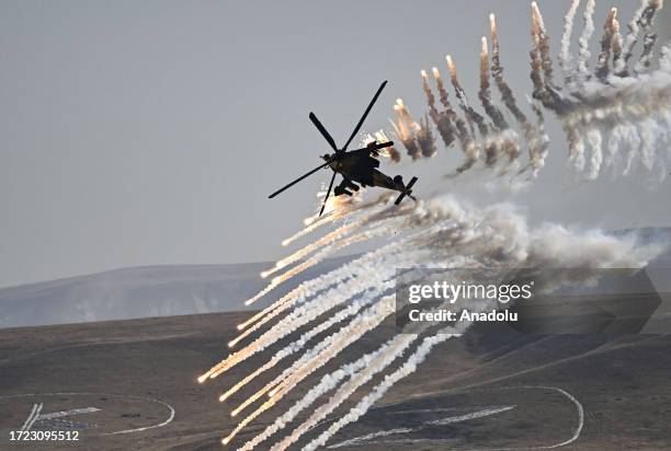 Helicopters perform during the military drill of Turkish Armed Forces in Ankara, Turkiye on October 13, 2023.