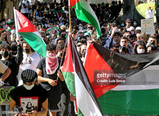 Los Angeles, CA - Students march across the UCLA campus in support of Palestinians caught up in the conflict that continued to rage unabated between...