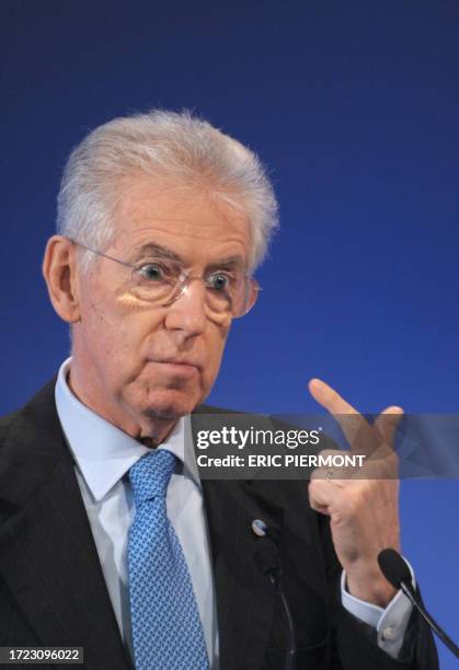 Italian Prime Minister Mario Monti gives a speech to close the 4th edition of the "Colloque Nouveau Monde" at the Economy Ministry in Paris on...