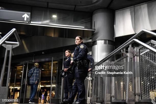 Members of the New York City police department patrol the subway on October 13, 2023 in New York City. Security has increased in New York City in the...