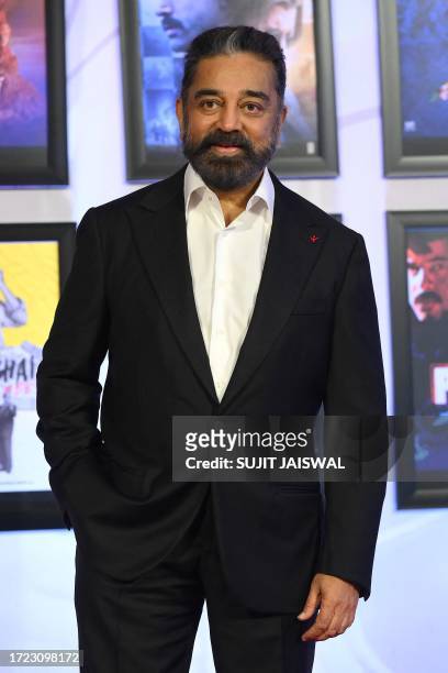 Bollywood actor Kamal Haasan poses for a photograph at the screening of Indian Hindi language film 'Khamosh' in Mumbai on October 13, 2023.