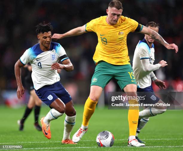 Harry Souttar of Australia accidentally connects with the face of Ollie Watkins of England during the international friendly match between England...